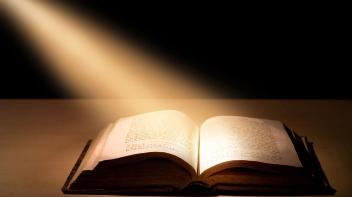 Image of light shinning on the Bible